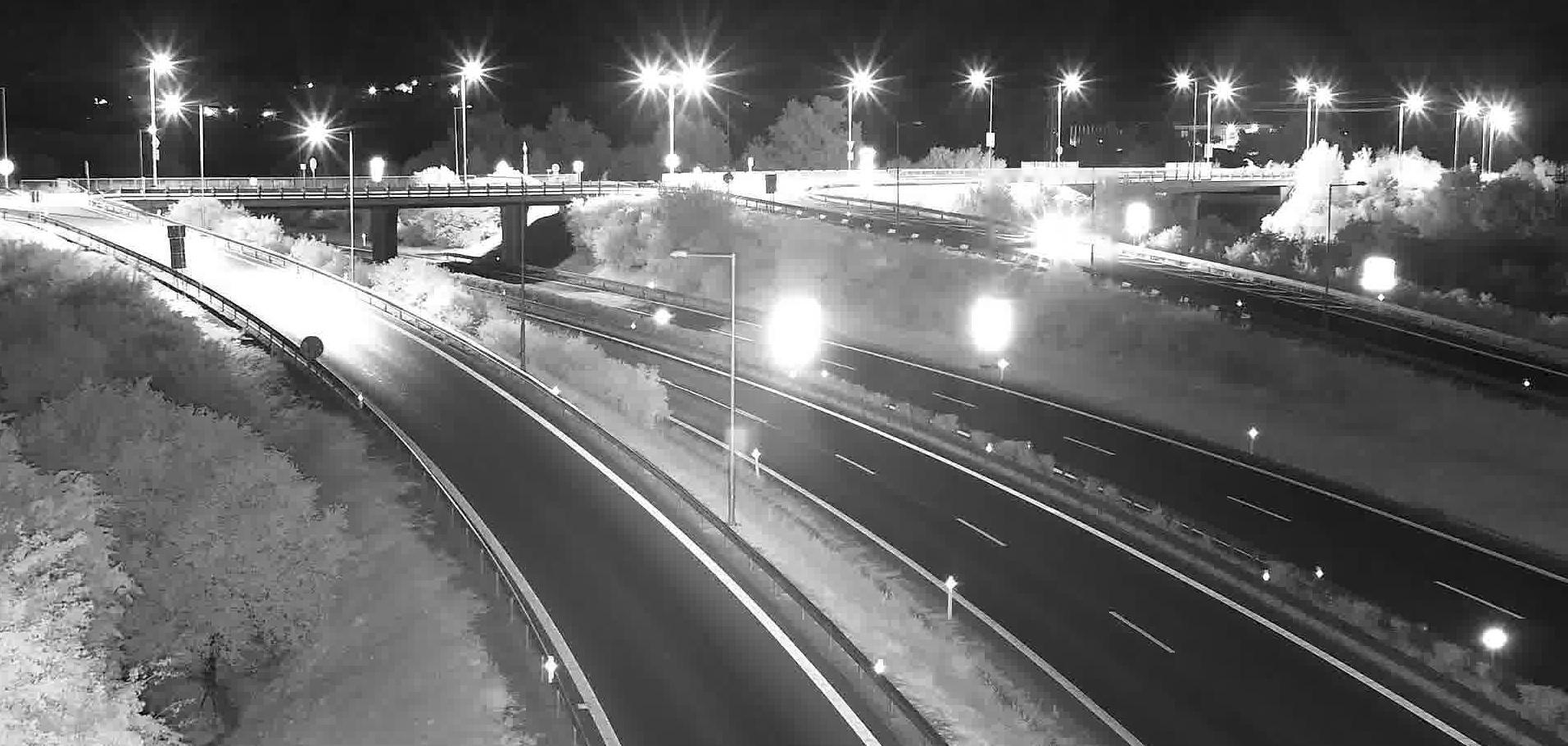 Traffic camera view with a detected stopped vehicle
